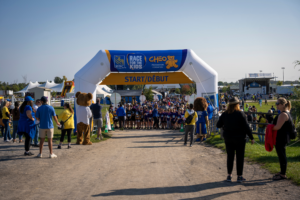 The starting line for CHEO's RBC Race for the Kids, packed with participants and onlookers.